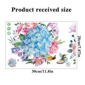 Detailed view of floral wall stickers showing flowers and birds with 30x20cm dimensions