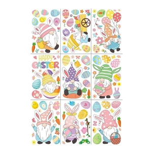 Set of 9 Easter gnome window stickers with colorful eggs, carrots and flower designs