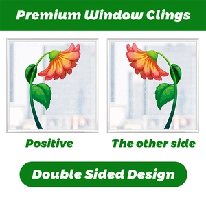 Double-sided window clings with red flower designs visible from both sides of the glass