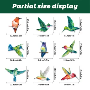 Detailed size chart for nine hummingbird window stickers showing width and height in cm and inches