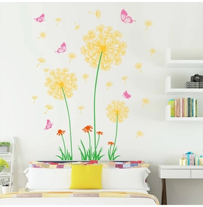 Bedroom wall decor detail showing colorful dandelion and pink butterfly wall stickers