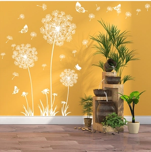 Detail of white dandelion wall stickers and flying butterflies in a cozy living room scene