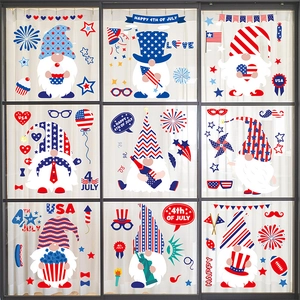 Independence Day window clings featuring gnomes and stars on glass with soft lighting