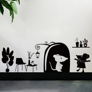 Detail of black mouse silhouette wall stickers with street lamp and potted plant decor