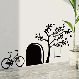 Detail of cute mouse hole wall decal with a tree, swing and vintage bicycle silhouette