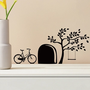 Black silhouette wall stickers featuring a vintage bike, archway, and tree swing on a beige wall
