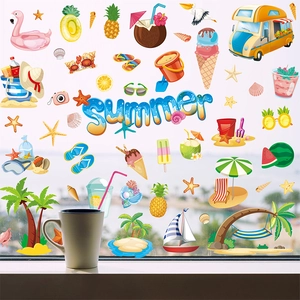 Detail view of summer beach window stickers with flamingo and palm tree on glass
