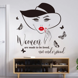Decorative wall sticker of woman in sun hat with butterfly accents and quote