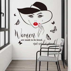 Minimalist wall decal with woman silhouette, butterflies, and quote for bedroom decor
