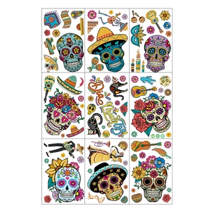 9-sheet set of Dia de los Muertos window clings with sugar skulls and marigolds