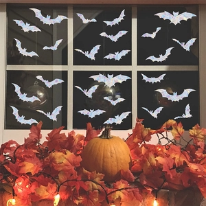 Macro detail of rainbow iridescent bat window decals for Halloween suncatcher glass decor
