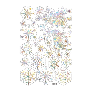 Detail view of laser cut Christmas snowflake and reindeer window stickers set LS23010