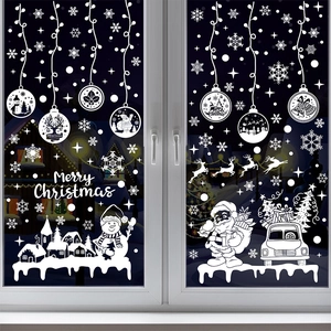 White Christmas window static stickers featuring reindeer and Santa on a winter night scene