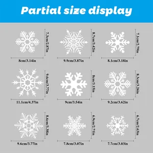 Detailed size chart showing nine snowflake window stickers with dimensions in cm and inches
