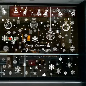 White Christmas window static stickers featuring bells, snowflakes and holiday greetings