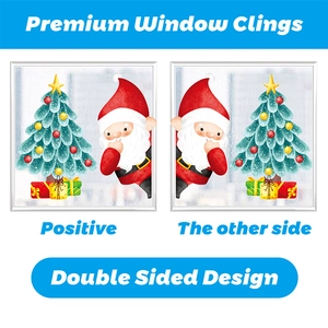 Detailed view of double-sided Christmas window clings with Santa and tree motifs