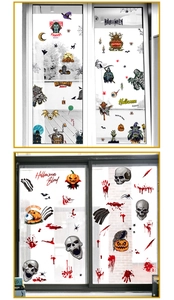 Detail showing Halloween static window stickers with vampire, witch, and pumpkin motifs