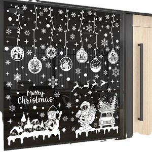 White Christmas window decals set with Santa, snowman and Merry Christmas lettering