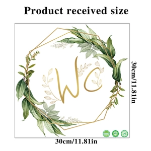 Detail view of 30x30cm PVC bathroom sticker with green leaves wreath and gold WC logo