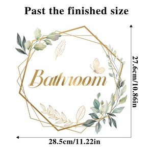 Detail view of Bathroom wall sticker with green leaves and gold frame measuring 28.5x27.6cm