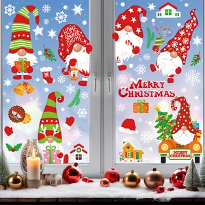 Detail of Christmas gnomes and snowflake window decals on a festive snowy background