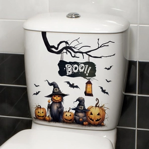 Halloween toilet sticker showing pumpkins with witch hats and spooky tree branches