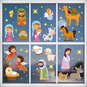 Detailed view of cartoon Nativity scene window stickers with Joseph and baby Jesus