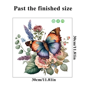 Close-up of butterfly and floral wall sticker showing 30cm square size dimensions