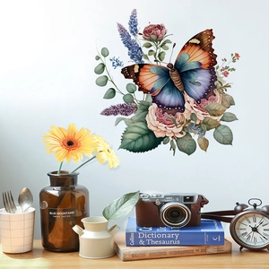 Close-up of floral butterfly wall decals styled with vintage books and home decor