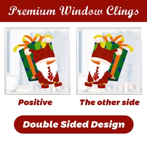 Detailed double-sided Christmas gnome window cling with red glitter hat and green gift box