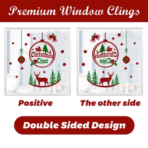 Close-up of double-sided Christmas window clings featuring glittery gnome and reindeer designs