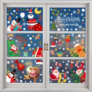 Festive Christmas static window stickers featuring Santa, snowman and gingerbread man designs