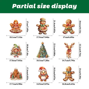 Detailed size guide for 9 Christmas window stickers including ginger bread and tree