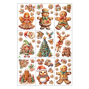 Macro display of Christmas window stickers with gingerbread man and festive patterns