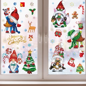 Christmas window decals showing watercolor gnomes, snowflakes and Merry Christmas gold lettering