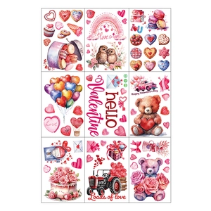Detailed view of watercolor Valentine stickers featuring teddy bears and red hearts