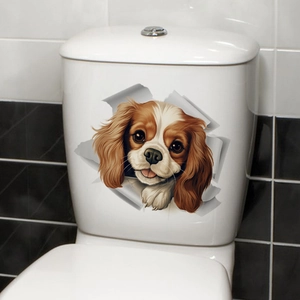 3D King Charles Spaniel decal with broken hole effect on a white toilet tank