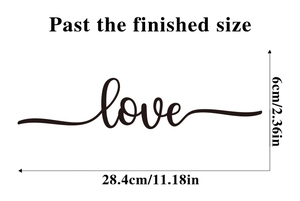 Detailed size schematic of black 'love' cursive vinyl wall sticker measuring 28.4x6cm