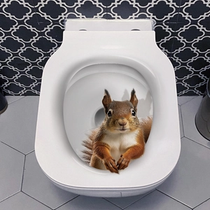 Close-up of 3D lifelike squirrel wall sticker applied on white ceramic toilet lid