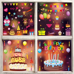 Detail of colorful birthday window stickers with cake, balloons and cartoon animals