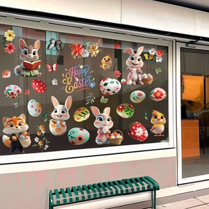 Detail of 3D Easter window stickers with bunny, fox, and chicks on a glass store front