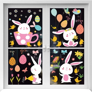 Detail of Easter window decals with rabbits, colorful eggs, and spring flowers on glass