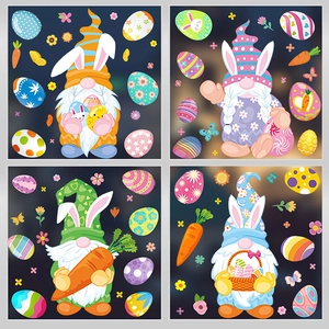 Detail of four Easter gnome window stickers with rabbit ears, eggs, and colorful carrots