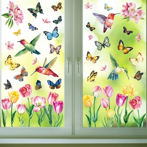 Close-up of double-sided spring window clings with hummingbirds and watercolor tulips