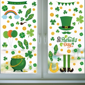 St. Patrick's Day window decals with clovers and rainbows on glass window display
