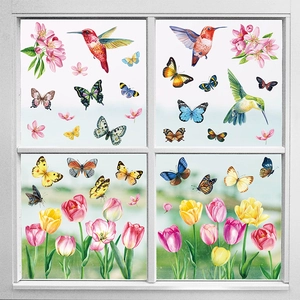 Spring hummingbird and butterfly window decals with floral tulip designs for glass decor