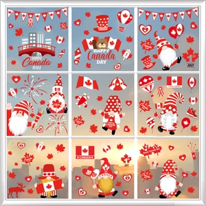 Detail of Happy Canada Day window stickers featuring red maple leaves and gnomes decor