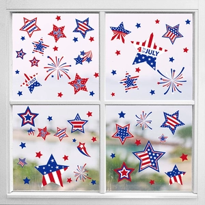 Independence Day window clings with stars and fireworks on a glass window pane