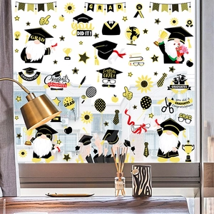 Graduation gnome window clings set with graduation hats and diplomas on a bright glass pane
