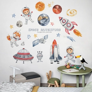 Space adventure wall decals featuring watercolor astronauts and planets in child's bedroom